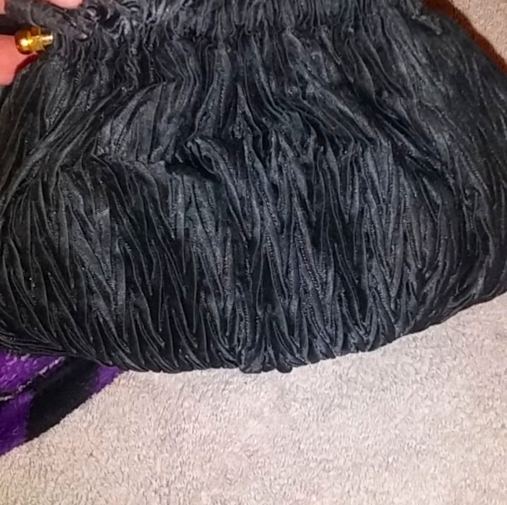 Black handbag with push lock